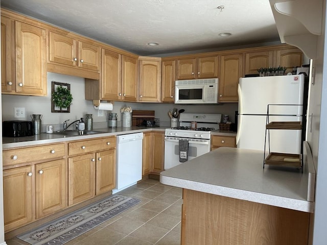 882 Brockton Ave Unit 10, Abington, MA 02351 - kitchen featuring white appliances, a sink, light tile patterned flooring, recessed lighting, and light countertops