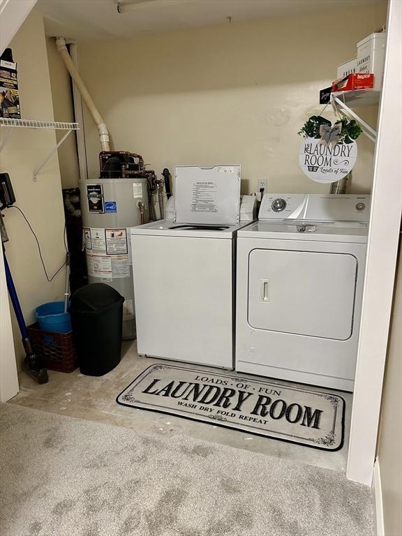 882 Brockton Ave Unit 10, Abington, MA 02351 - laundry area with washer and dryer and water heater