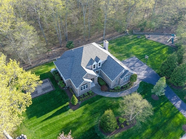aerial view with a wooded view