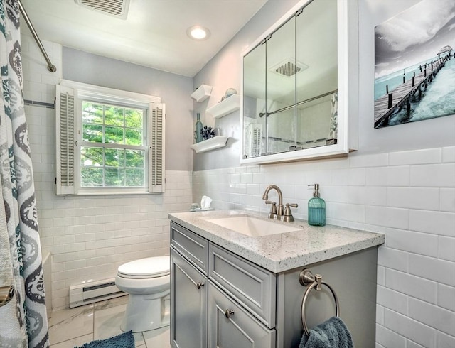 50 Lake St Unit B, Winchester, MA 01890 - full bathroom with tile walls, vanity, a shower with shower curtain, a baseboard radiator, and wainscoting