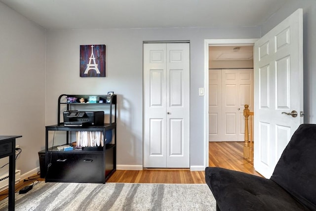 50 Lake St Unit B, Winchester, MA 01890 - office area featuring wood finished floors and a baseboard heating unit