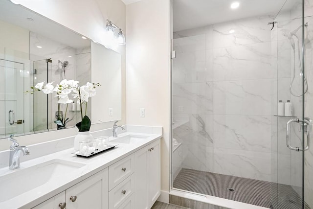 bathroom featuring vanity and walk in shower