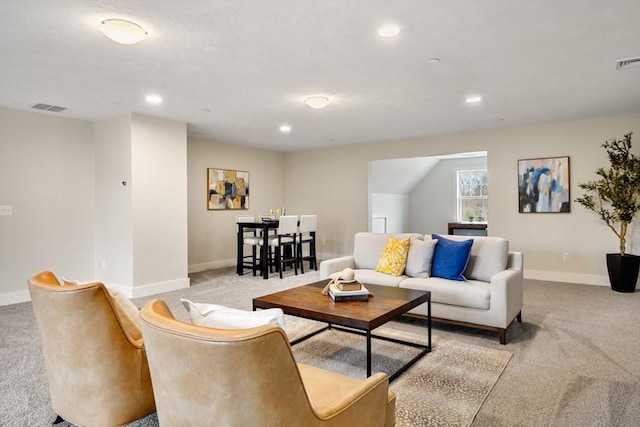 living room featuring light colored carpet