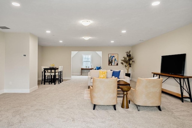 living room featuring light colored carpet