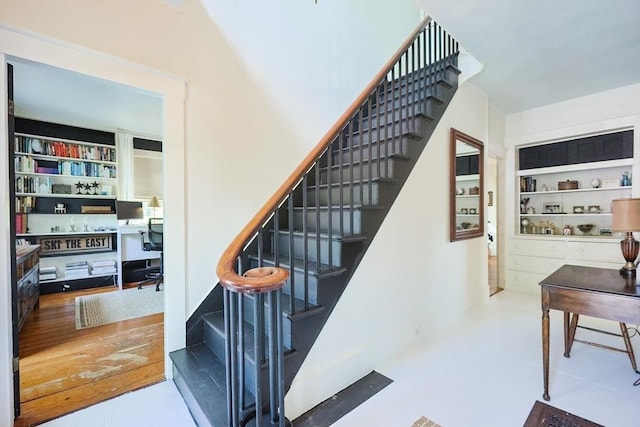 193 Main St, Medway, MA 02053 - stairway featuring built in shelves