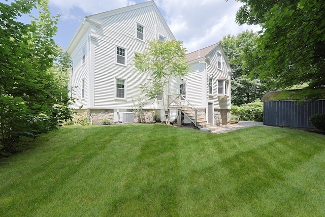 193 Main St, Medway, MA 02053 - rear view of house featuring a lawn