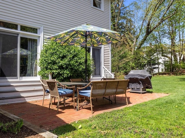 view of patio featuring a grill