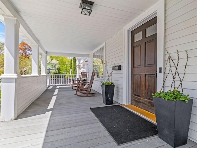 deck featuring covered porch