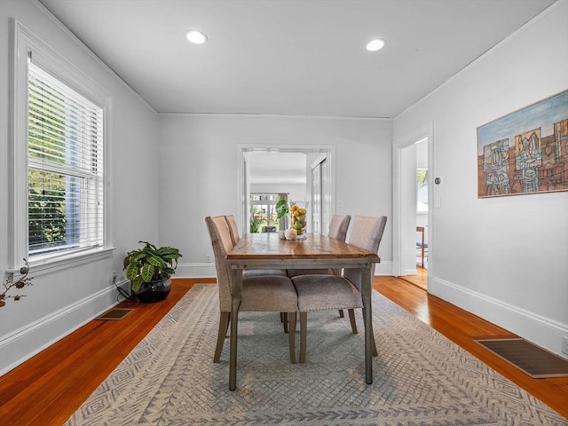 dining room with visible vents, recessed lighting, and wood finished floors