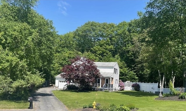 37 Teaberry Ln, Gardner, MA 01440 - view of property hidden behind natural elements featuring a garage and driveway