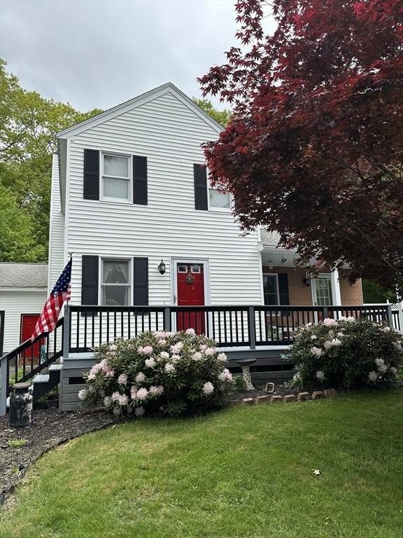 37 Teaberry Ln, Gardner, MA 01440 - back of property with a yard and a deck