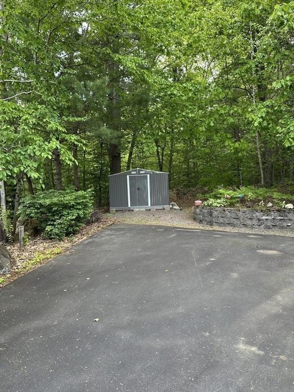 37 Teaberry Ln, Gardner, MA 01440 - exterior space featuring a wooded view