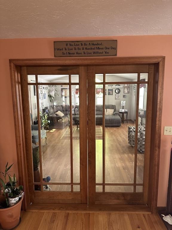 37 Teaberry Ln, Gardner, MA 01440 - doorway to outside with wood finished floors and french doors