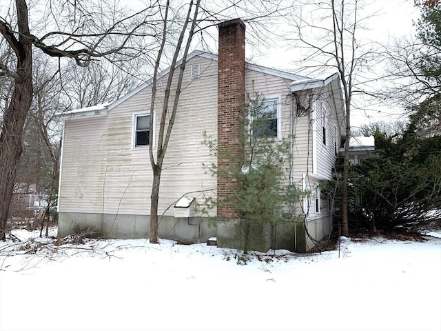 view of snow covered property