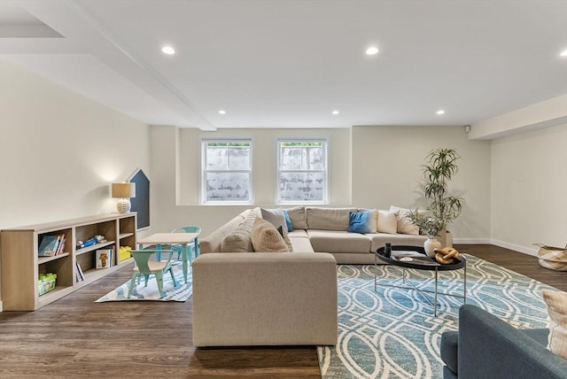 living area with wood finished floors, recessed lighting, and baseboards