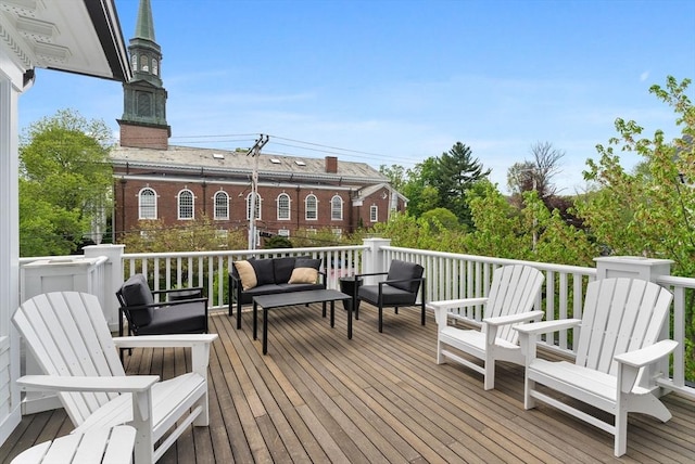 wooden deck featuring outdoor lounge area