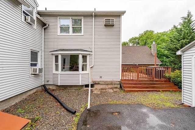 267 Maple St, East Longmeadow, MA 01028 - back of property featuring a wooden deck and cooling unit