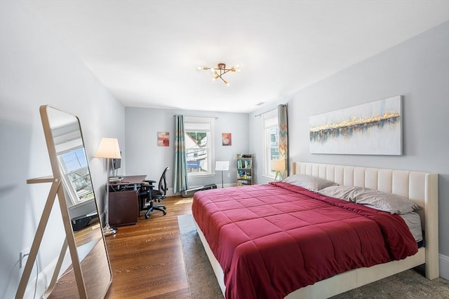 202 Middlesex Ave Unit 2, Medford, MA 02155 - bedroom featuring wood finished floors and a desk
