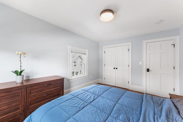 202 Middlesex Ave Unit 2, Medford, MA 02155 - bedroom with baseboards and a closet