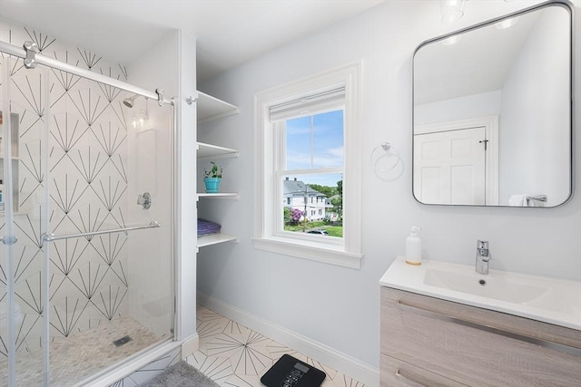 202 Middlesex Ave Unit 2, Medford, MA 02155 - full bath featuring a stall shower, vanity, tile patterned floors, and baseboards
