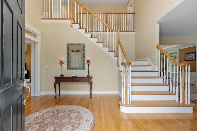 51 Drumlin Hill Rd, Bolton, MA 01740 - foyer entrance featuring wood finished floors, stairs, baseboards, and a high ceiling