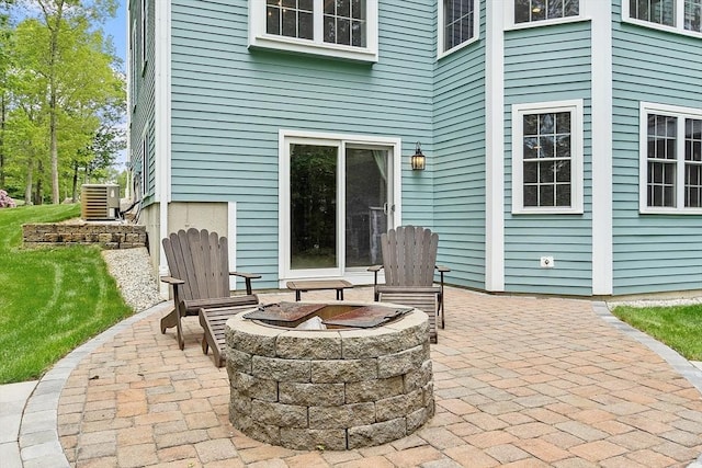 51 Drumlin Hill Rd, Bolton, MA 01740 - view of patio featuring a fire pit and central AC unit