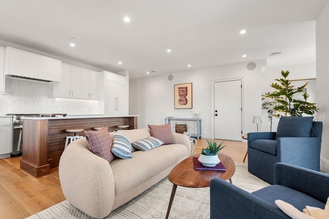 60 Williams St Unit 402, Boston, MA 02130 - living room with light wood-type flooring and recessed lighting