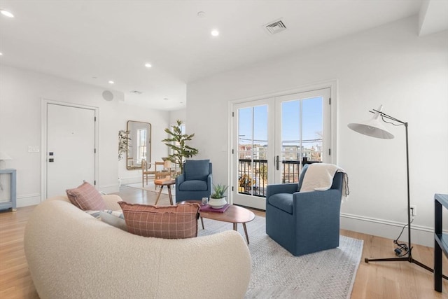 60 Williams St Unit 402, Boston, MA 02130 - living room with recessed lighting, light wood-style flooring, and baseboards
