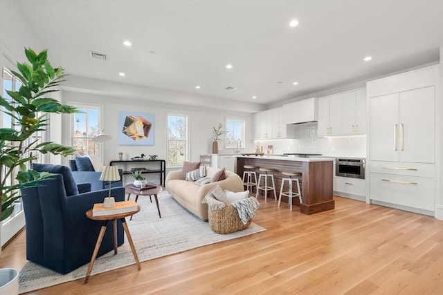 60 Williams St Unit 402, Boston, MA 02130 - living area featuring recessed lighting and light wood-type flooring