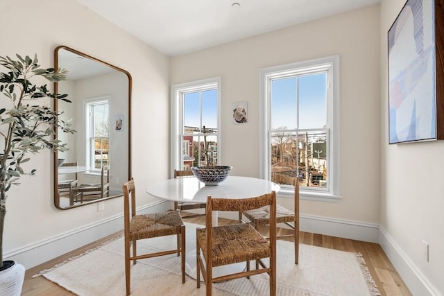 60 Williams St Unit 402, Boston, MA 02130 - dining area with light wood-type flooring and baseboards