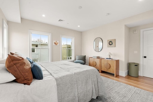 60 Williams St Unit 402, Boston, MA 02130 - bedroom featuring wood finished floors, recessed lighting, and baseboards