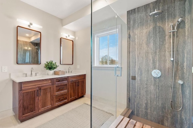60 Williams St Unit 402, Boston, MA 02130 - full bathroom featuring walk in shower, double vanity, and tile patterned flooring
