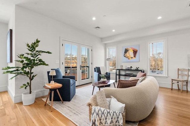 60 Williams St Unit 402, Boston, MA 02130 - living room featuring light wood-style flooring, healthy amount of natural light, recessed lighting, and baseboards