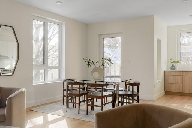 dining area featuring light hardwood / wood-style floors