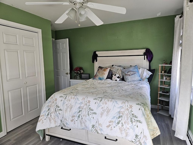 bedroom featuring wood finished floors and ceiling fan