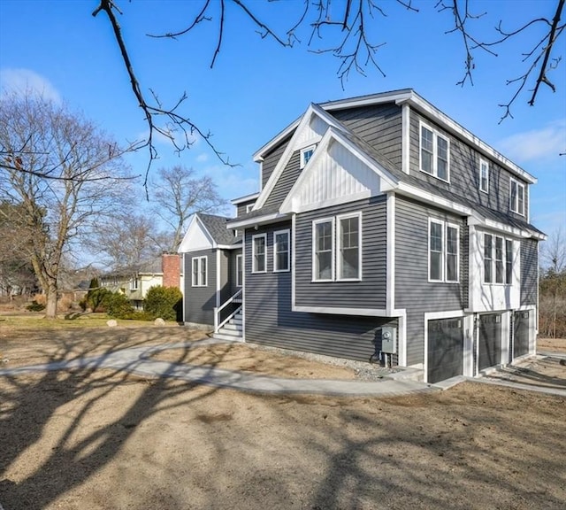 view of home's exterior with a garage