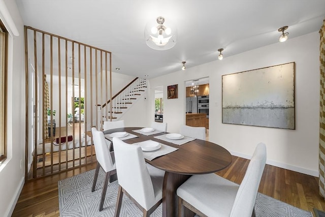 25 Day St, Newton, MA 02466 - dining room with stairs, baseboards, and wood finished floors