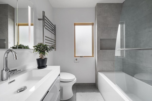 25 Day St, Newton, MA 02466 - bathroom with toilet, baseboards, and vanity