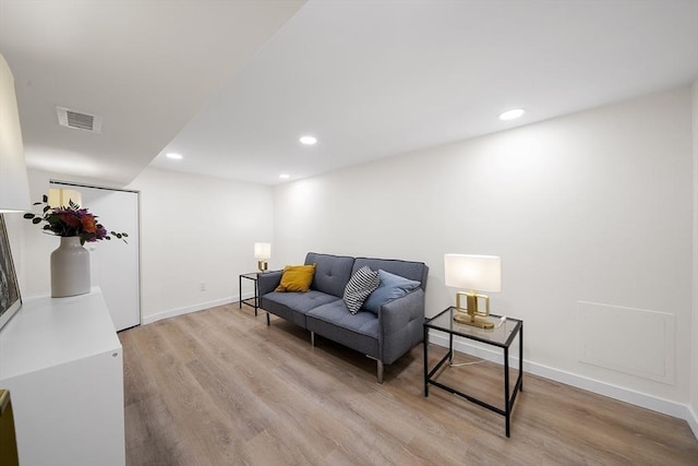 25 Day St, Newton, MA 02466 - living room featuring light wood-style flooring, recessed lighting, and baseboards