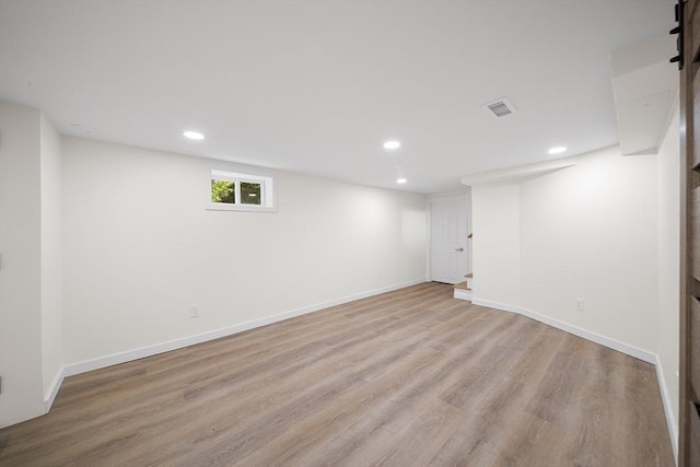 25 Day St, Newton, MA 02466 - basement featuring light wood-type flooring, recessed lighting, and baseboards