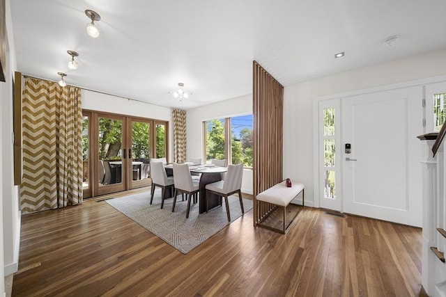 25 Day St, Newton, MA 02466 - dining room with french doors, wood finished floors, and a chandelier