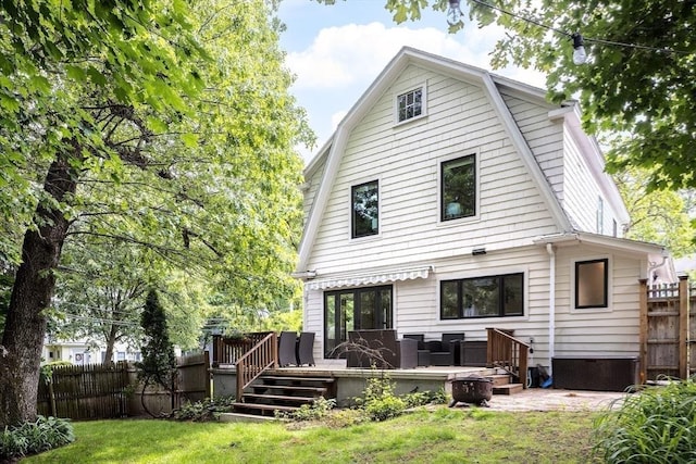 25 Day St, Newton, MA 02466 - rear view of property with a gambrel roof and a wooden deck