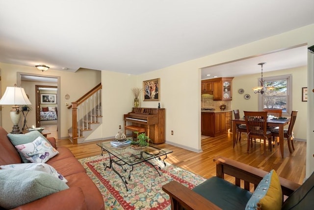 living room with light hardwood / wood-style flooring