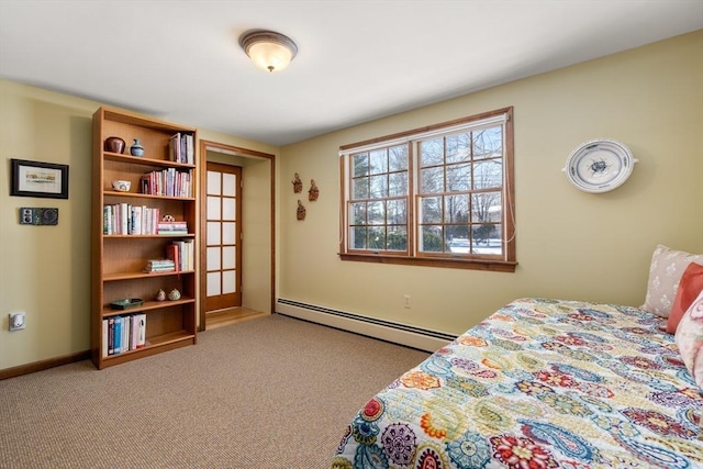 bedroom with a baseboard radiator and light carpet