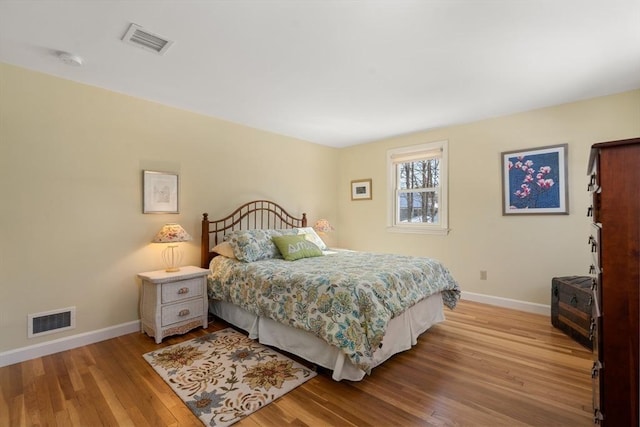 bedroom with light wood-type flooring