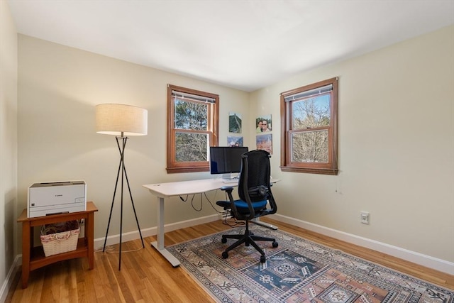 office area with wood-type flooring