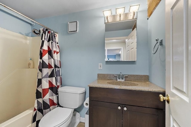 full bathroom featuring toilet, vanity, and shower / bathtub combination with curtain