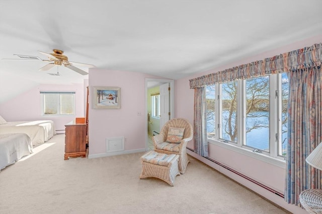 sitting room with baseboard heating, light colored carpet, lofted ceiling, and ceiling fan