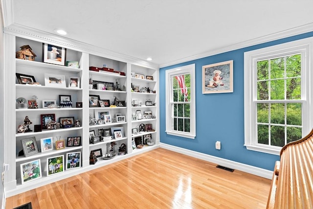 16 Old Colony Way, Whitman, MA 02382 - unfurnished room featuring baseboards, wood finished floors, healthy amount of natural light, and crown molding