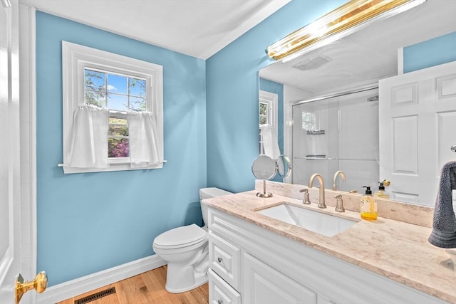 16 Old Colony Way, Whitman, MA 02382 - bathroom with a stall shower, healthy amount of natural light, toilet, and baseboards